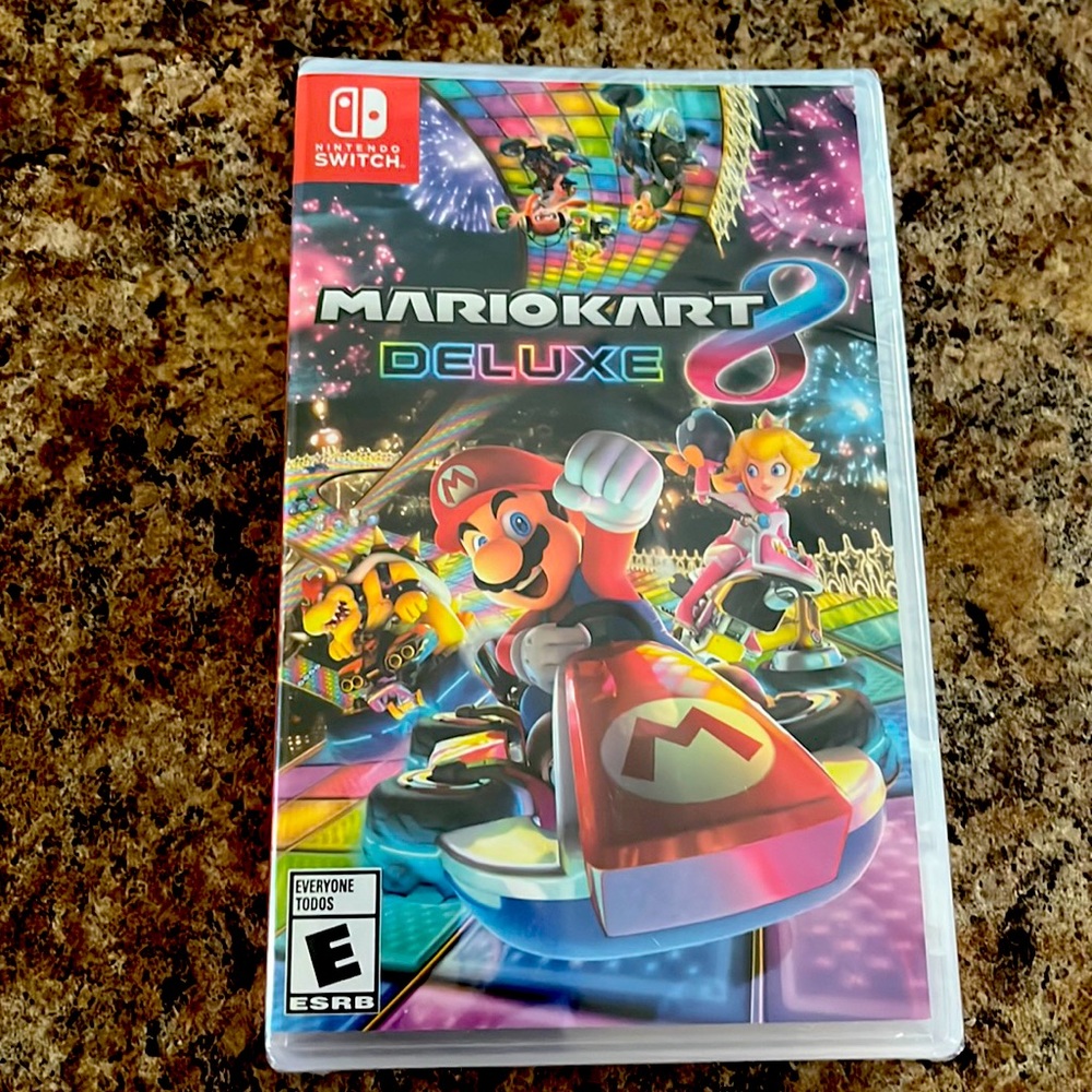 Brand new, unopened, received 2 for Xmas, Mario kart deluxe 8 Nintendo switch.